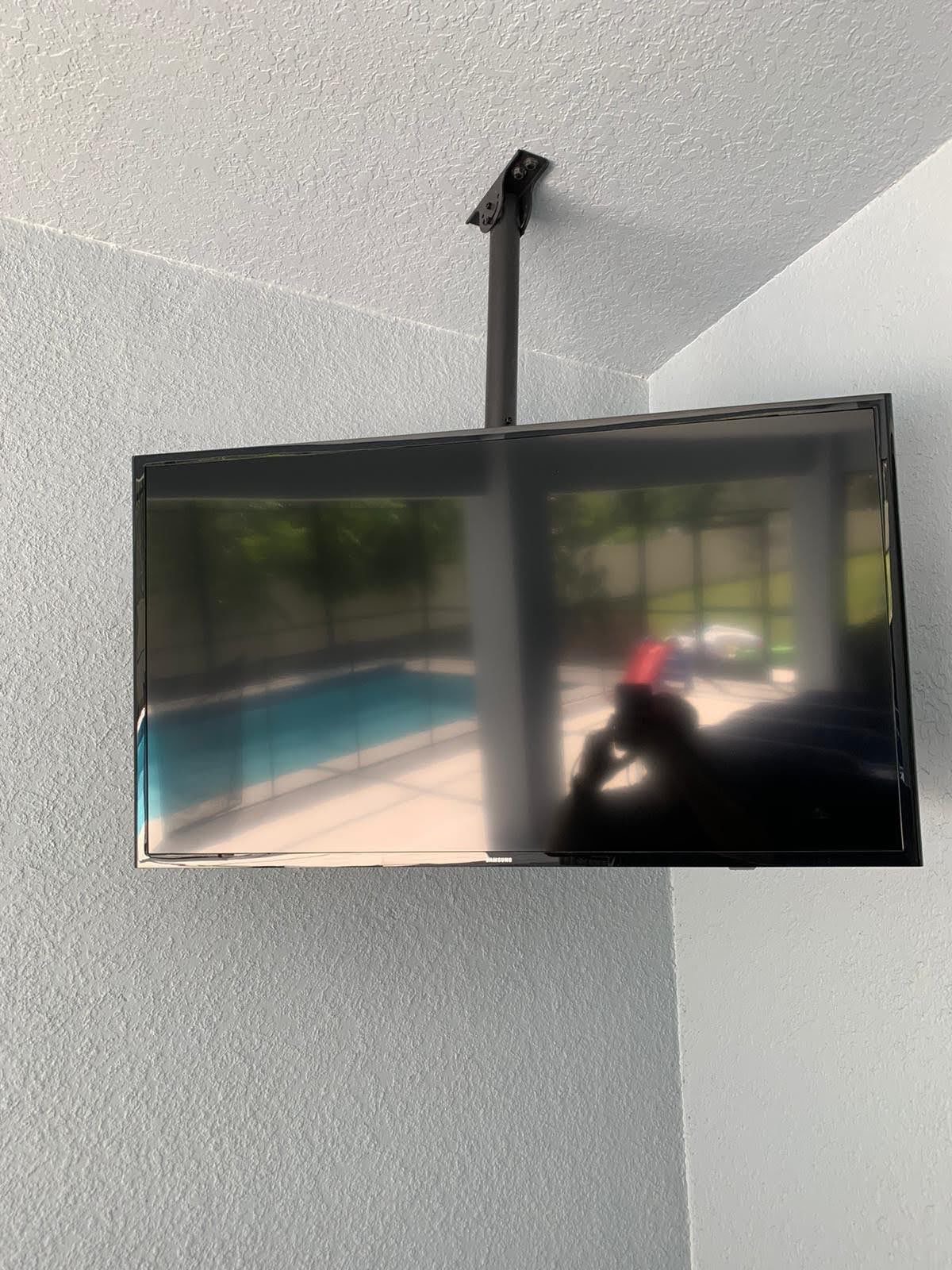 Tv installed from the celling using a celling mount