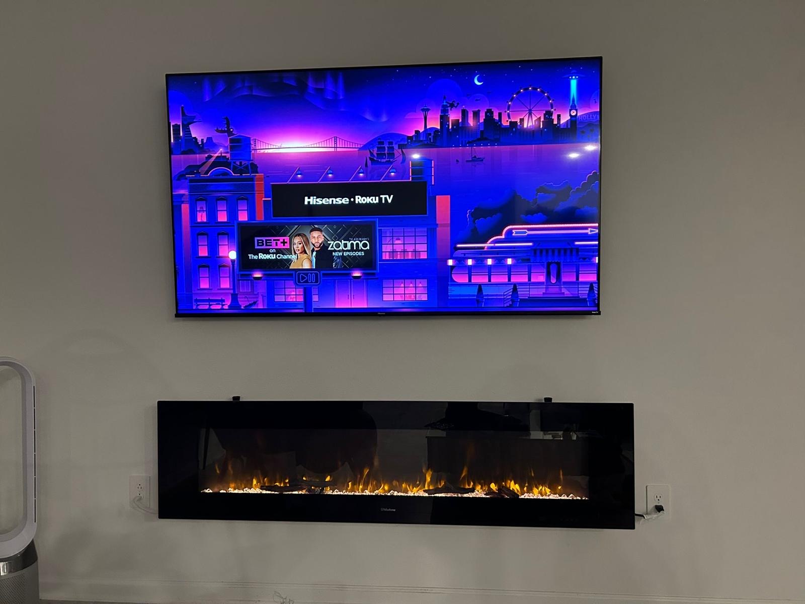 Pro services tech installed a tv on a tilt mount along with a fire place